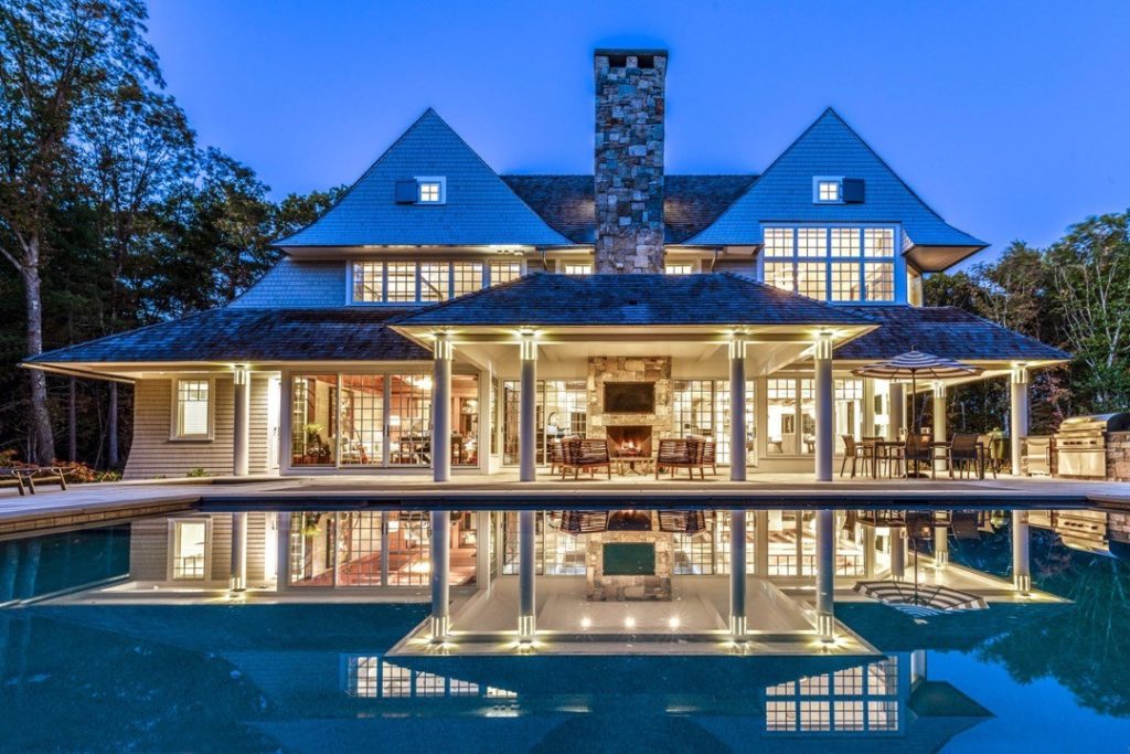 Smart home in Boston, MA is equipped with automated window shades and blinds installed by Architectural Window Treatments.